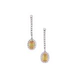 A pair of yellow sapphire and diamond pendent earrings