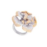 A diamond flower dress ring