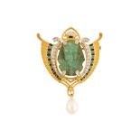 A carved emerald, diamond and enamel brooch