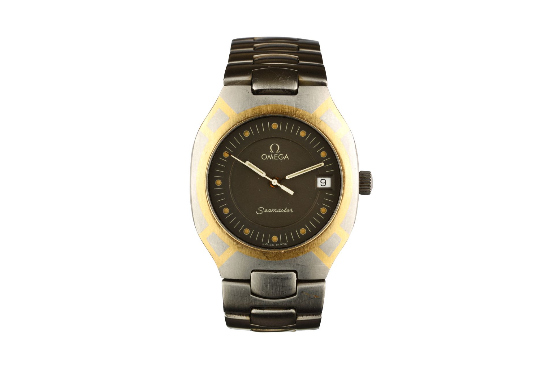 Omega. A stainless steel and gold inlaid quartz calendar bracelet watch. Model: Polaris. Case