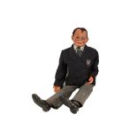 A 1940's Ventriloquists dummy, mid-20th century, modelled as a cheeky schoolboy in the manner of "
