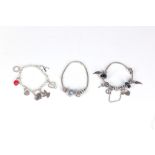 Three charm bracelets, including two by Pandora, s