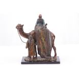 An Edwardian cold-painted spelter figural table li