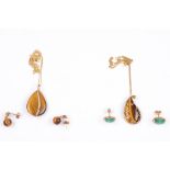 A small group of jewellery, including two tiger's eye pendants and two pairs of gem-set earrings,