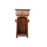 A Liberty style Arts and Crafts oak hall cupboard,