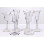 An interesting collection of six wine glasses, fiv