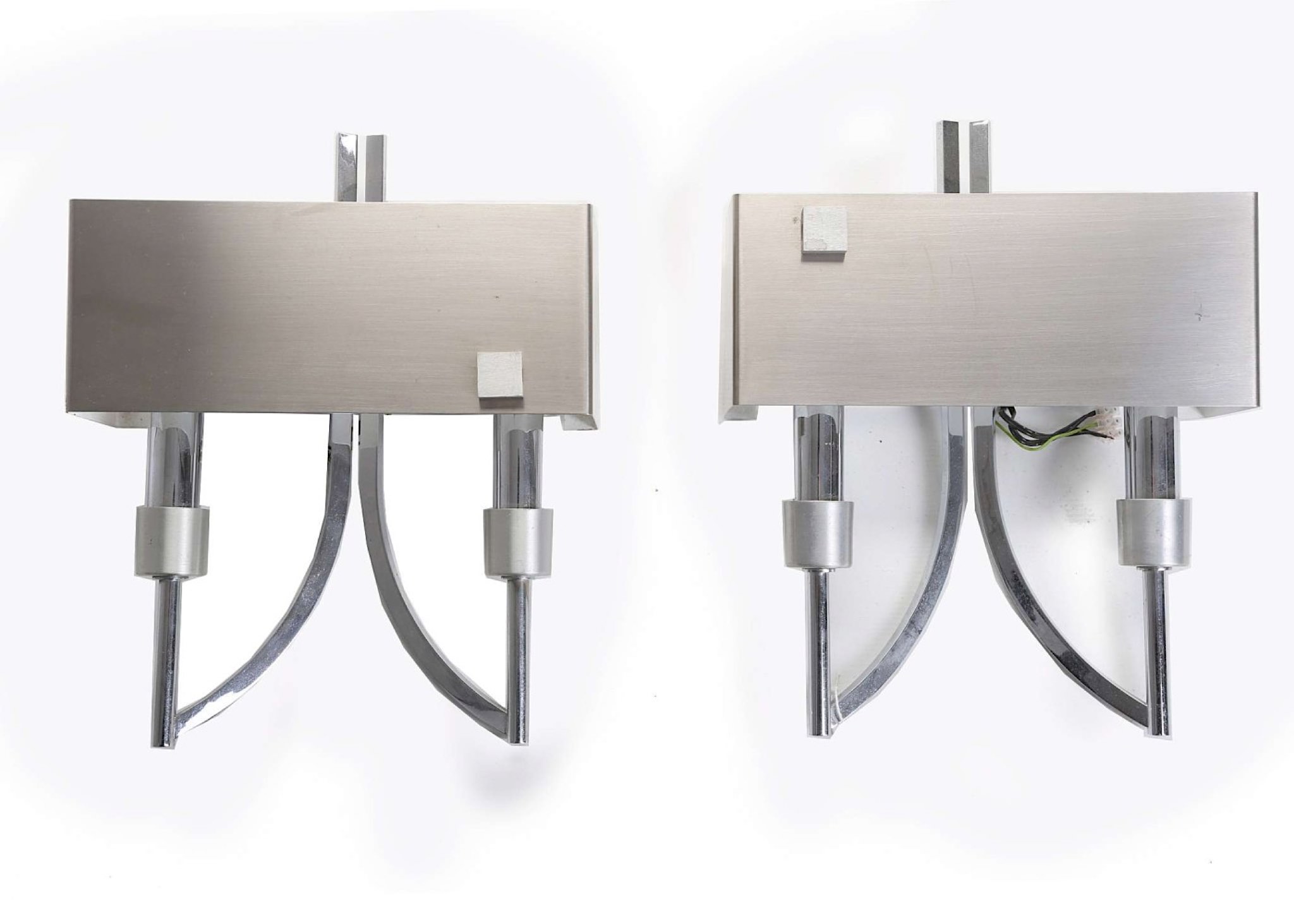 A pair of 1970's French wall lights, 20th century, in brushed steel and chrome, 29cm wide x 38cm