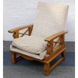 A pair of Swedish light oak armchairs, early 20th century, upholstered in patterned fawn fabric,
