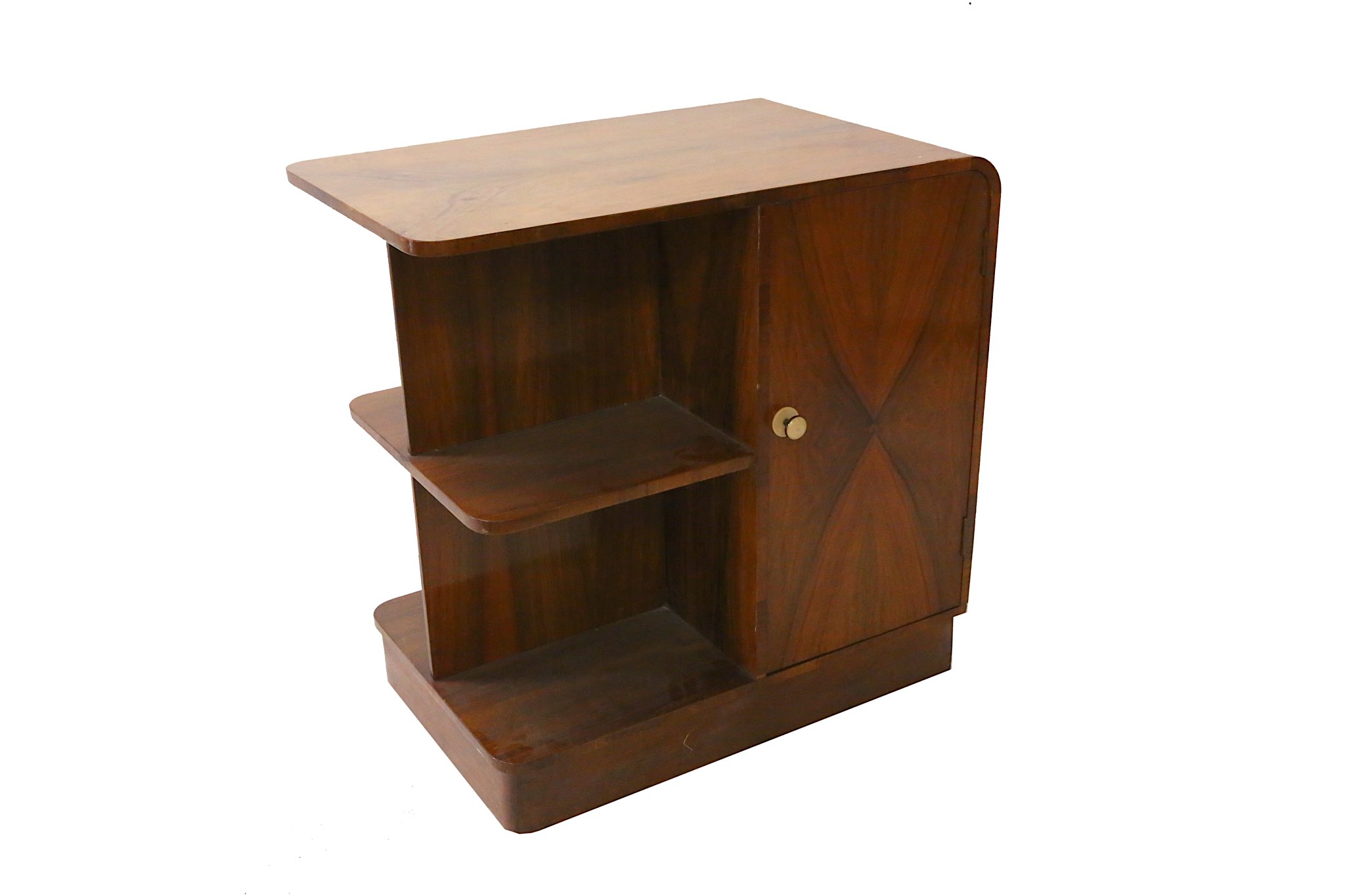 An Art Deco style figured walnut low cabinet, with a single drawer and open tiers, 70cm wide