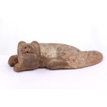 A Chinese pottery figure of a dog, Han dynasty, 13