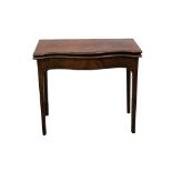 A George III serpentine mahogany tea table, with a folding top, on square tapered legs, 84cm W