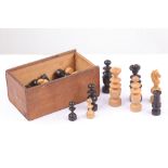 A boxwood and stained ebony chess set, early 20th