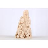 A Chinese ivory carving of Shoulao and boys group,