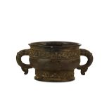 A CHINESE BRONZE INCENSE BURNER, GUI. Ming Dynasty. Of archaistic gui form, the rounded body