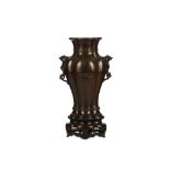 A CHINESE BRONZE LANÇA VASE. Qing Dynasty, 18th Century. A quadrilobed baluster form with the