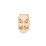 AN IVORY ‘MASK’ NETSUKE. 20th Century. The well carved mask depicting a Chinese official, signed