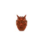 A WOOD NETSUKE OF A NOH MASK, SIGNED DEME. 19th Century. The mask of a female demon, Hannya, with