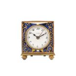 AN EARLY 20TH CENTURY FRENCH GILT METAL AND CHAMPLEVE ENAMEL MINIATURE DESK ALARM CLOCK of square