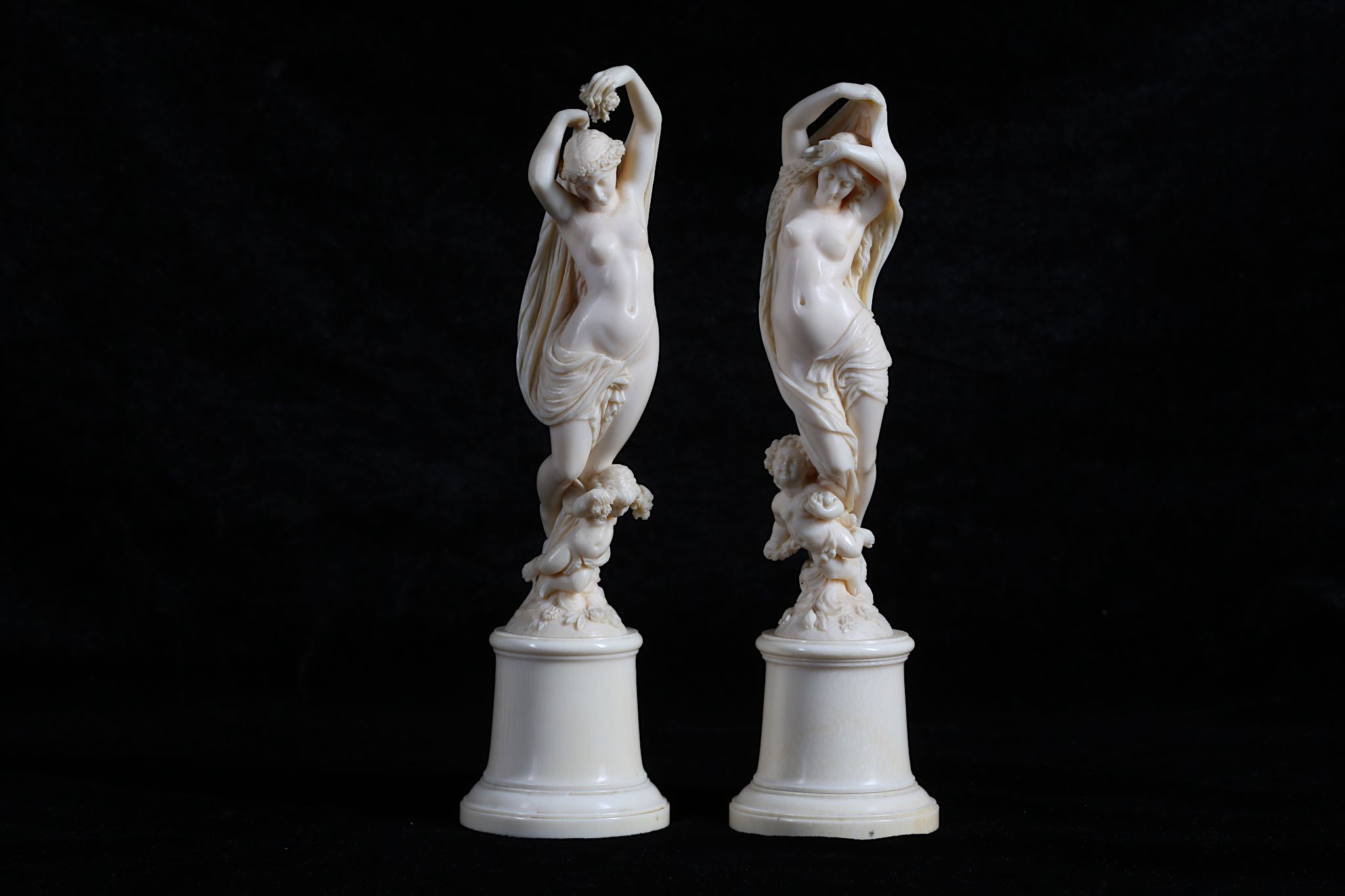 A PAIR OF 19TH CENTURY FRENCH DIEPPE IVORY ALLEGORICAL FIGURES OF DAY AND NIGHT the figure of Day
