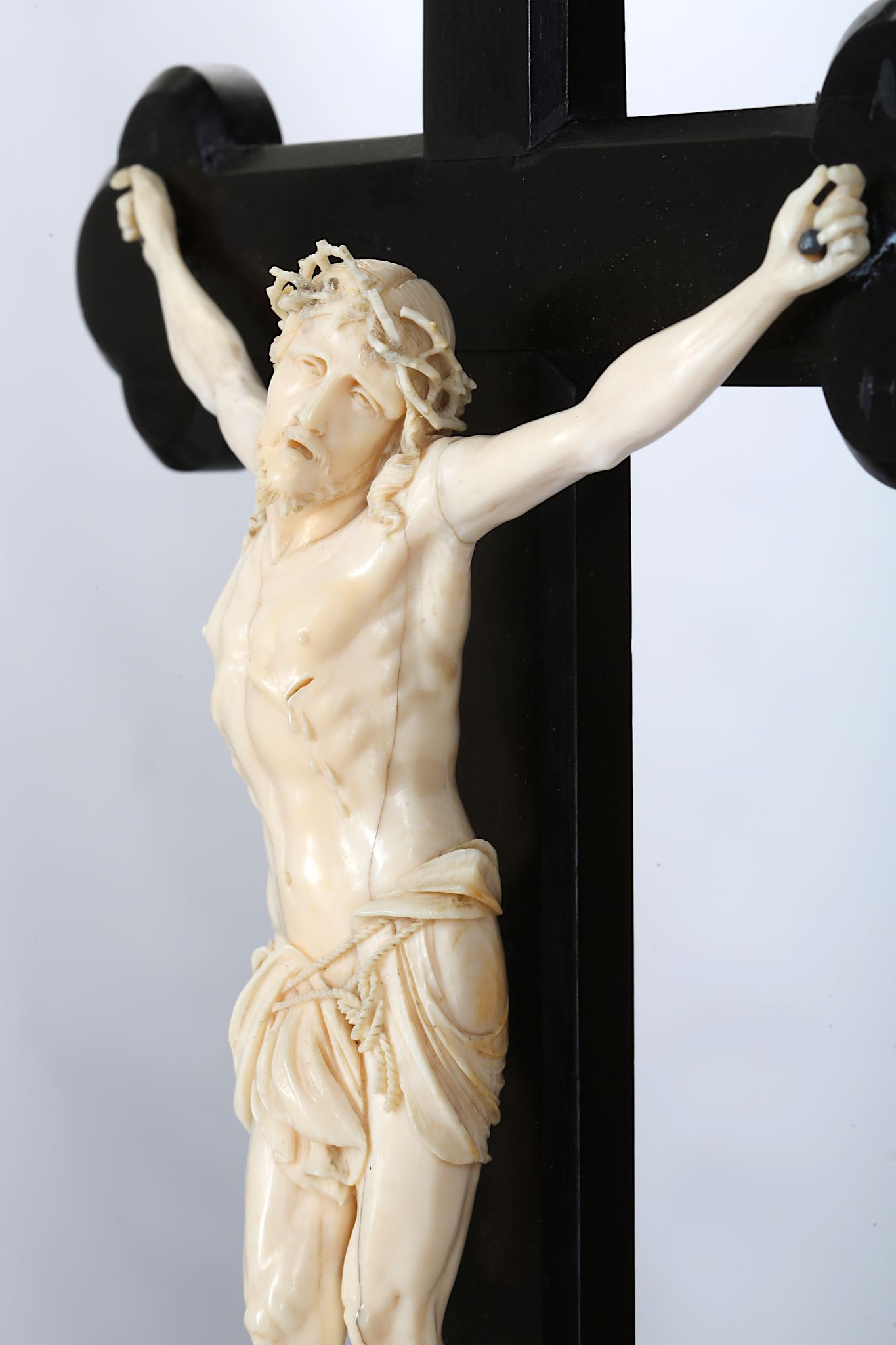 A 19TH CENTURY CARVED IVORY AND EBONY CRUCIFIX  the Corpus Christi figure of Christ depicted wearing - Image 4 of 5