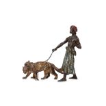 FRANZ BERGMAN (AUSTRIAN, 1861-1936): A COLD PAINTED BRONZE FIGURE OF AN AFRICAN MAN WITH TWO