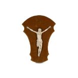 A 19TH CENTURY CARVED IVORY CORPUS CHRISTI the crucifix figure of Christ depicted wearing the