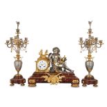 AN EXCEPTIONALLY FINE THIRD QUARTER 19TH CENTURY GILT AND SILVERED BRONZE AND ROUGE MARBLE FIGURAL