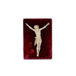 A 19TH CENTURY CARVED IVORY CORPUS CHRISTI the crucifix figure of Christ depicted wearing the