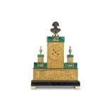 AN EARLY 19TH CENTURY FRENCH EMPIRE PERIOD GILT BRONZE AND MALACHITE MOUNTED MANTEL CLOCK the case