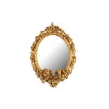 A 19TH CENTURY GILTWOOD AND GESSO OVAL GIRANDOLE MIRROR the oval frame naturalistically modelled