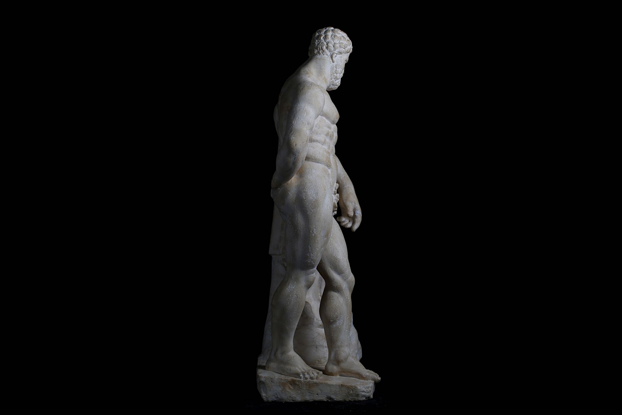 AN 18TH CENTURY CARVED LIMESTONE FIGURE OF THE WEARY HERCULES OF LYSIPPOS, AFTER THE ANTIQUE the - Image 7 of 11