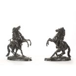 AFTER GUILLAUME COUSTOU (FRENCH, 1677-1746): A PAIR OF 19TH CENTURY FRENCH BRONZE MODELS OF THE