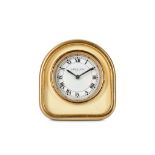 A LATE 20TH CENTURY CARTIER GILT BRASS ALARM CLOCK of arched frame form with cream enamel