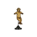 A 16TH CENTURY ITALIAN GILT BRONZE FIGURE OF A PUTTO the flying figure now lacking wings and