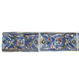 SIX 18TH / 19TH CENTURY IZNIK RECTANGULAR TILES decorated with scrolling foliage and flowers on a