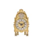 A RARE EARLY 18TH CENTURY GILT BRONZE TABLE CLOCK WITH ALARM the break-arch gilt dial surmounted