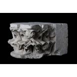 A FRENCH GOTHIC CARVED LIMESTONE CORBEL, POSSIBLY 12TH CENTURY carved with stylised fruit and