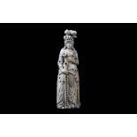 A 19TH CENTURY DIEPPE IVORY FIGURE OF JOAN OF ARC SET WITH PASTE JEWELS the standing figure