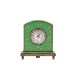 AN EARLY 20TH CENTURY SWISS SILVERED METAL AND ENAMEL MINIATURE TRAVELLING CLOCK of arched form on a