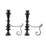A PAIR OF BRONZE AND WROUGHT IRON JACOBEAN STYLE FIRE ANDIRONS, PROBABLY 19TH CENTURY the knopped
