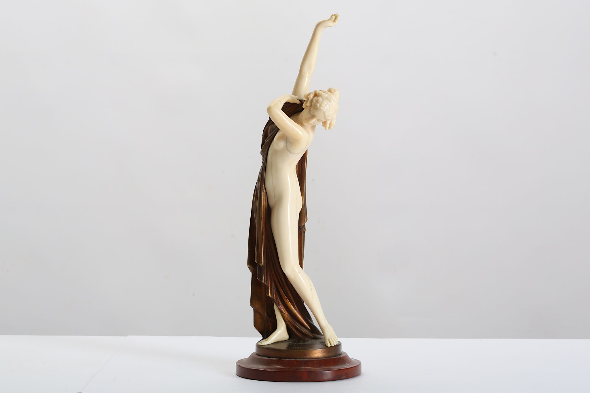 ERNST SEGER (GERMAN: 1868-1939): A CARVED IVORY AND BRONZE FIGURE OF A GIRL 'AFTER THE BATH' the - Image 2 of 8