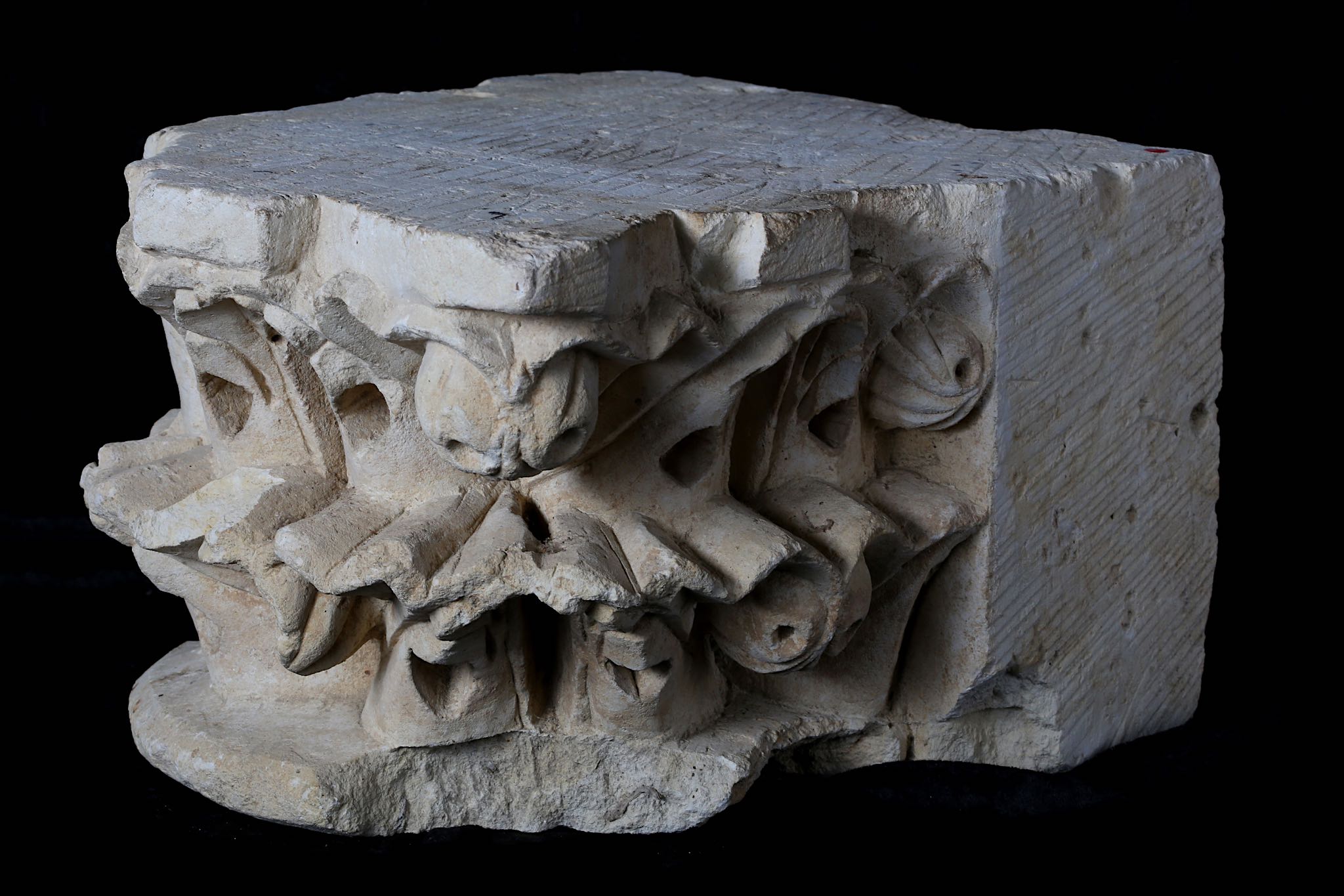 A FRENCH GOTHIC CARVED LIMESTONE CORBEL, POSSIBLY 12TH CENTURY carved with stylised fruit and - Image 3 of 3