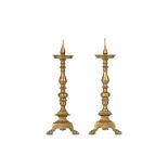 A PAIR OF 17TH / 18TH CENTURY NORTH EUROPEAN BRONZE PRICKET CANDLESTICKS the knopped and ringed