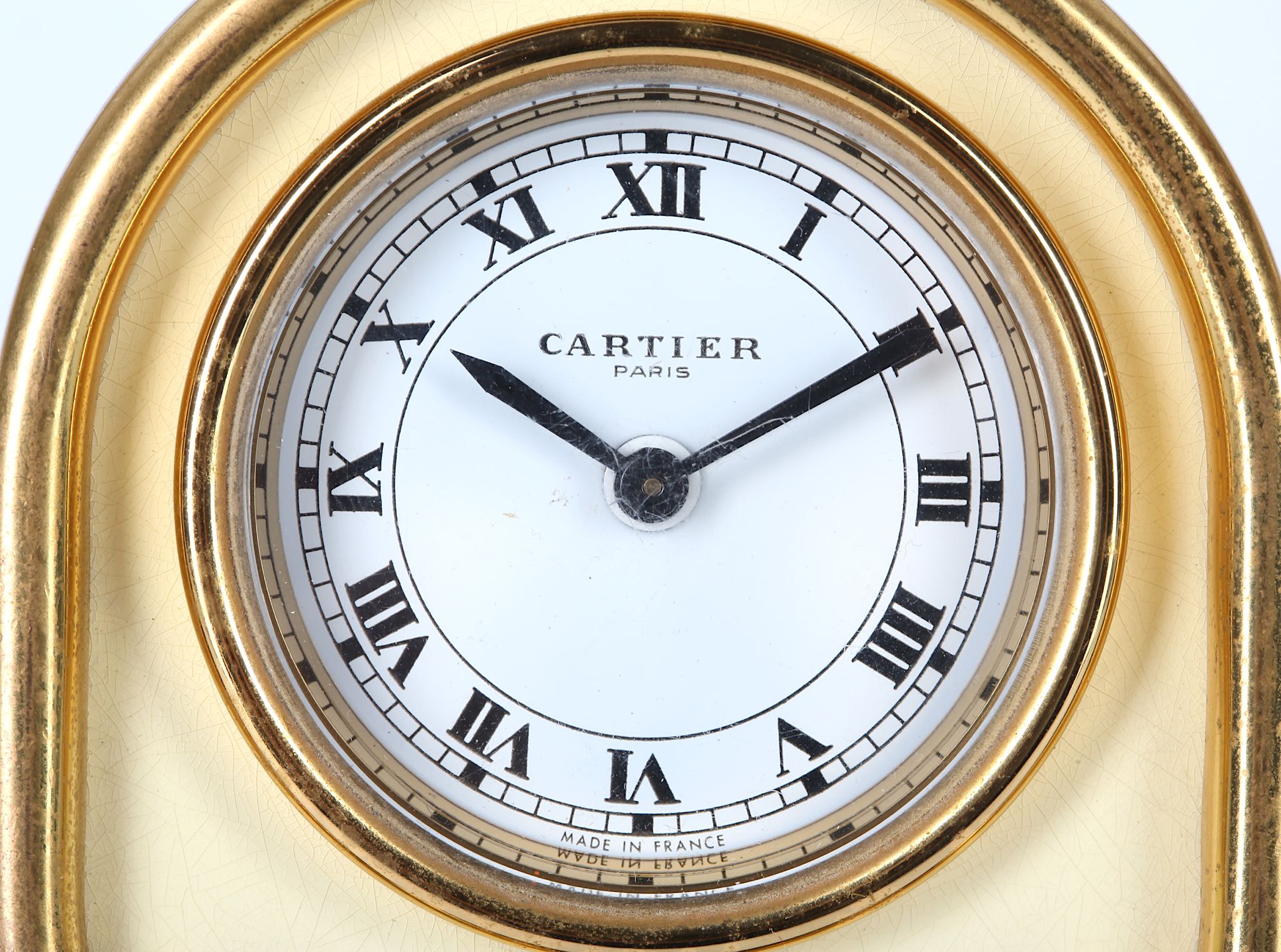 A LATE 20TH CENTURY CARTIER GILT BRASS ALARM CLOCK of arched frame form with cream enamel - Image 4 of 5