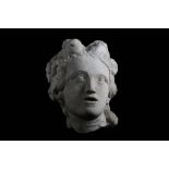 A 17TH CENTURY ITALIAN MARBLE HEAD OF A BACCHANTE / CERES her mouth open and her hair adorned with