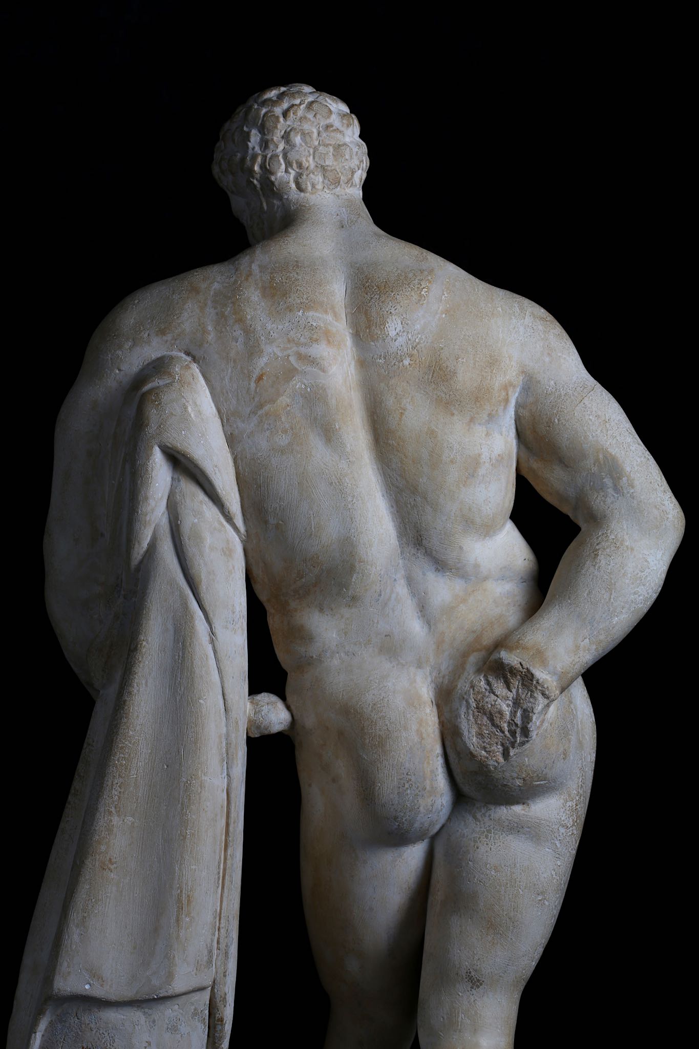 AN 18TH CENTURY CARVED LIMESTONE FIGURE OF THE WEARY HERCULES OF LYSIPPOS, AFTER THE ANTIQUE the - Image 9 of 11