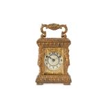 AN EARLY 20TH CENTURY GILT BRASS MINIATURE CARRIAGE CLOCK in the Renaissance Revival style, the case