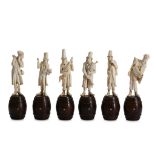 A SET OF SIX LATE 19TH CENTURY GERMAN CARVED IVORY FIGURES OF MUSICIANS the musical band all