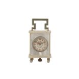 AN EARLY 20TH CENTURY SWISS MOTHER OF PEARL AND SILVERED SUB MINIATURE TRAVELLING CLOCK the mother