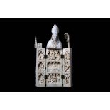 A LARGE 19TH CENTURY DIEPPE IVORY TRIPTYCH FIGURE OF A BISHOP the standing figure holding a